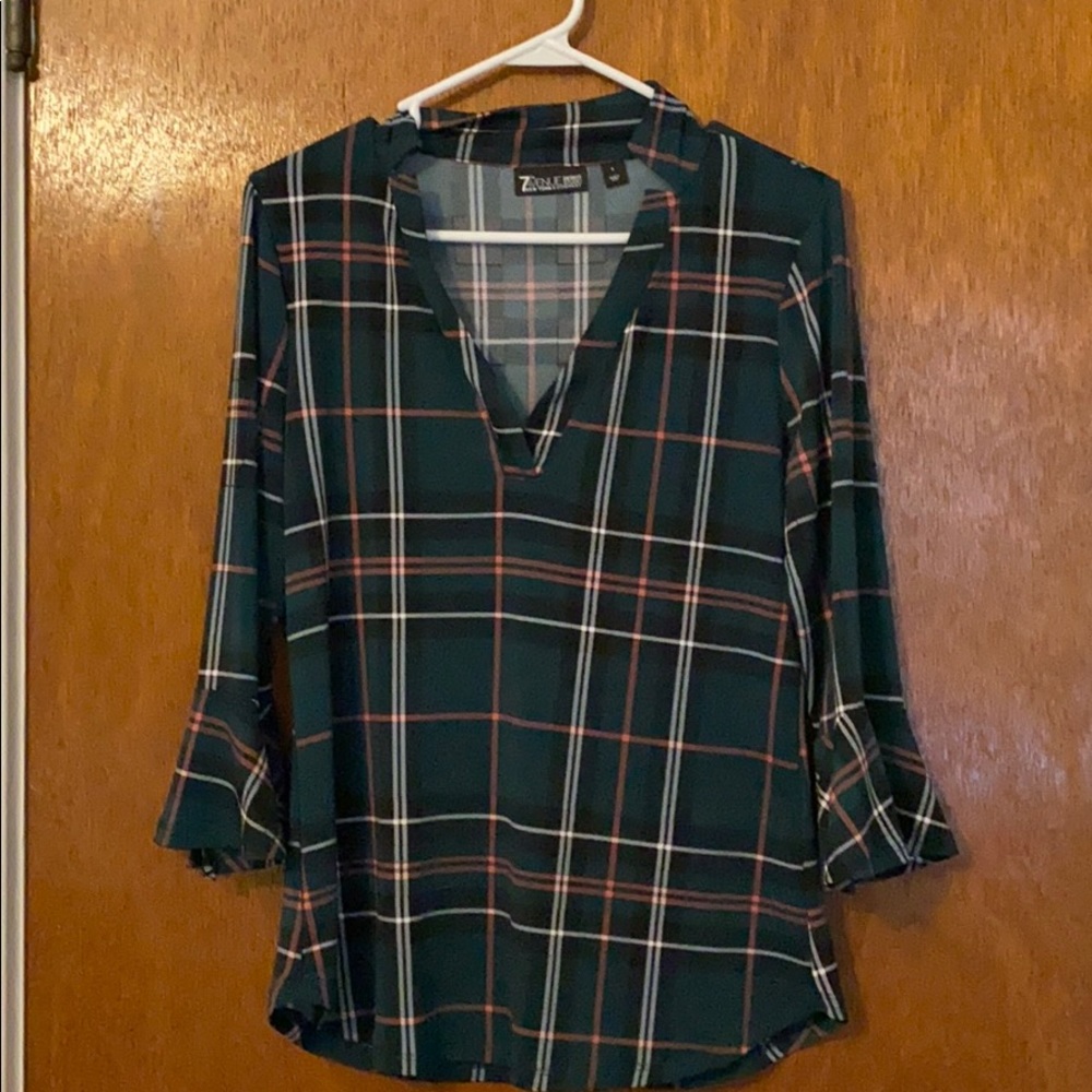 Bell sleeved plaid shirt.